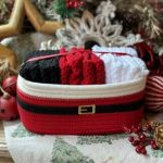 Canasta con 12 toallas Santa